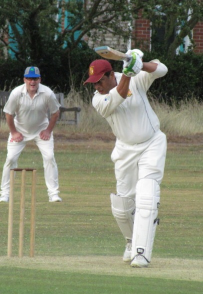 Amit drives on his way to a run-a-ball 92